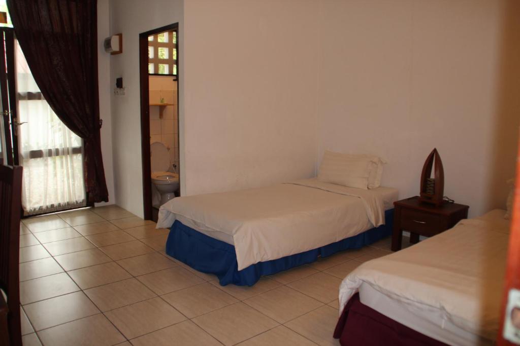 Basaga Holiday Residences Κουτσίνγκ Δωμάτιο φωτογραφία